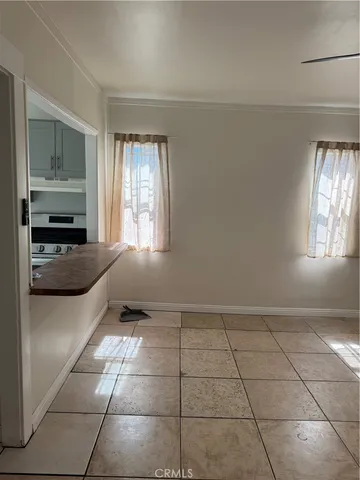 a kitchen with a sink a counter top space and appliances