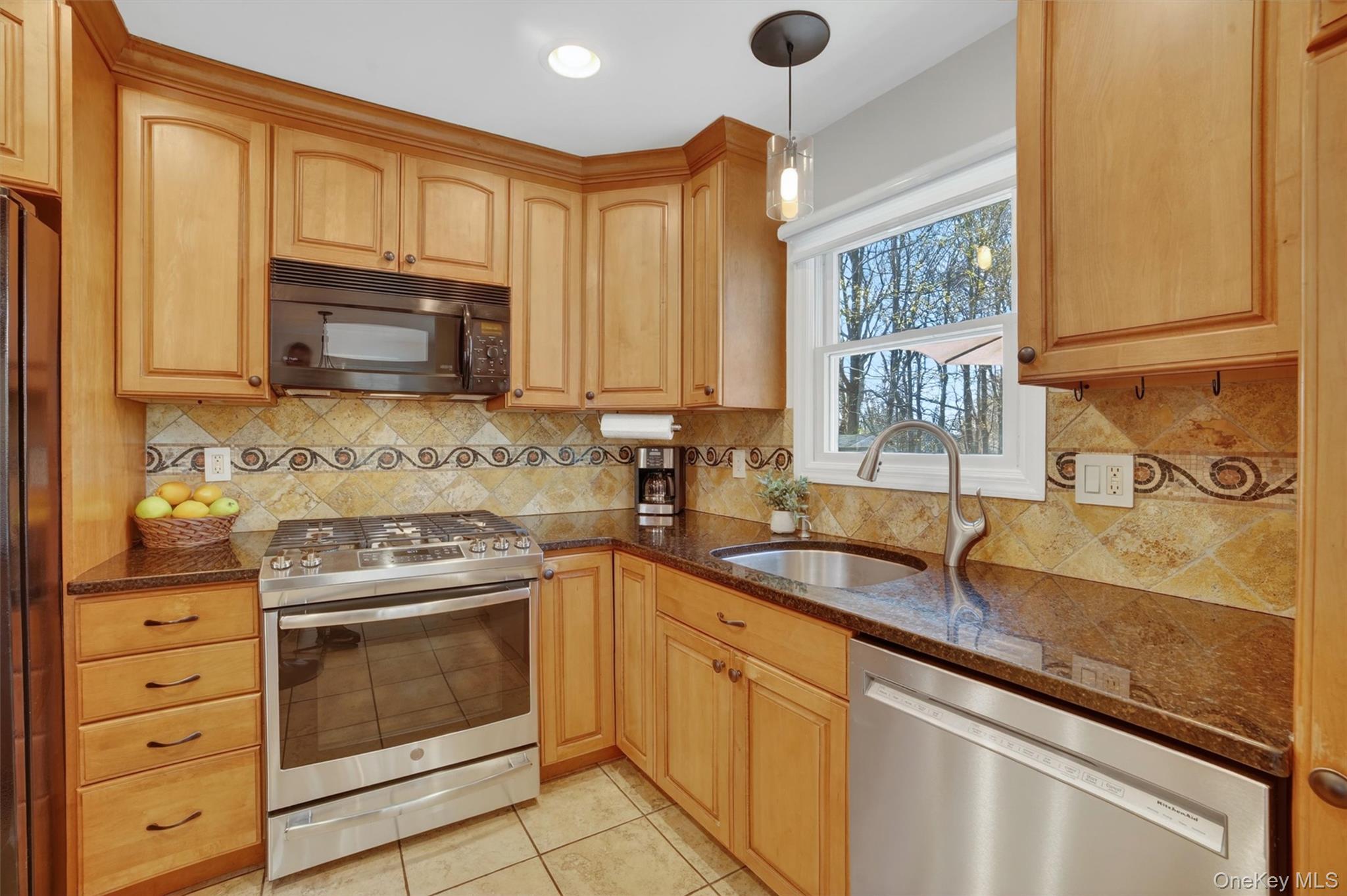 9 Ridge Road Cortlandt Manor, NY 10567 - Photo 15 of 47 Granite counter tops, SS appliances and custom cabinetry