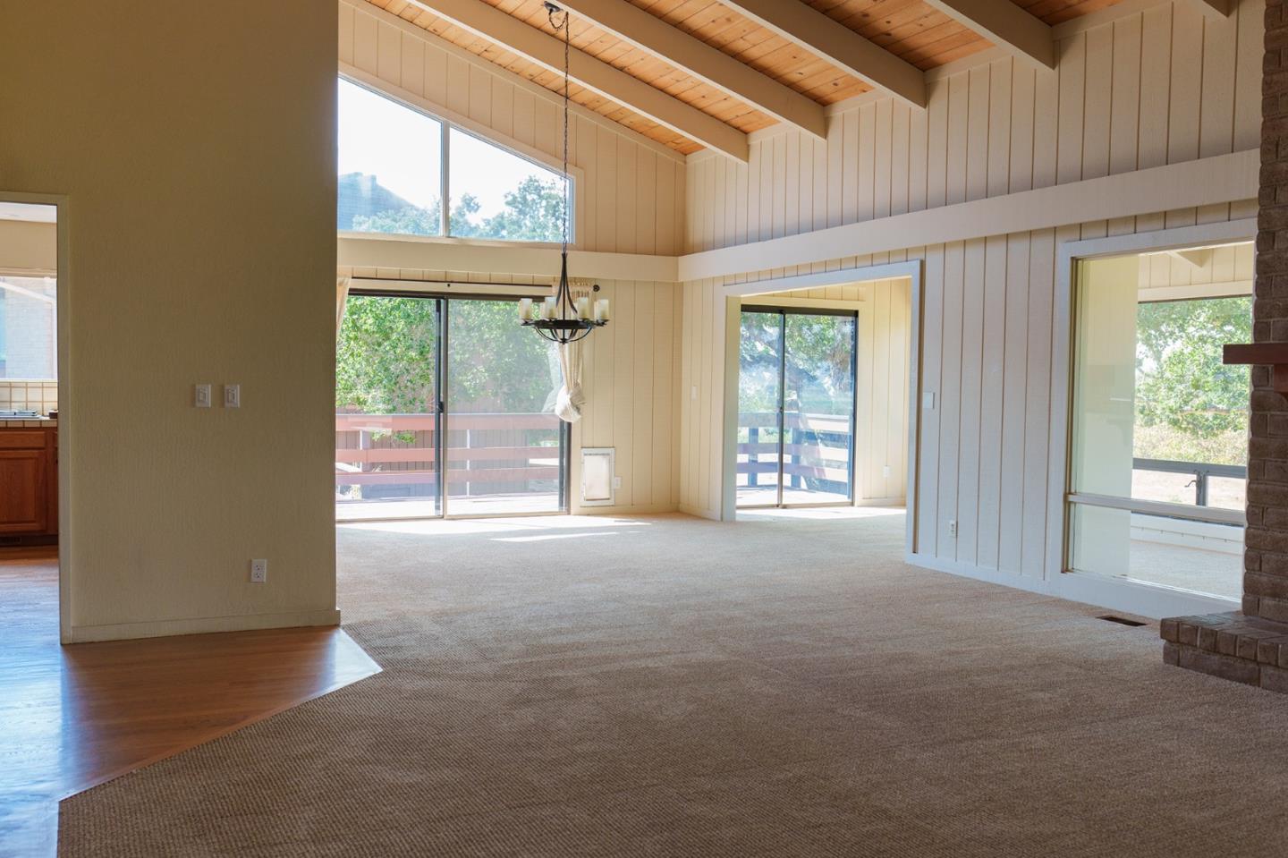 14170 Reservation Road Salinas, CA 93908 - Photo 11 of 22 a view of an empty room with a fireplace and a window