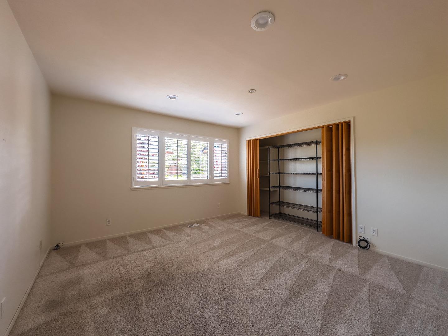 14170 Reservation Road Salinas, CA 93908 - Photo 18 of 22 a view of an empty room with a window