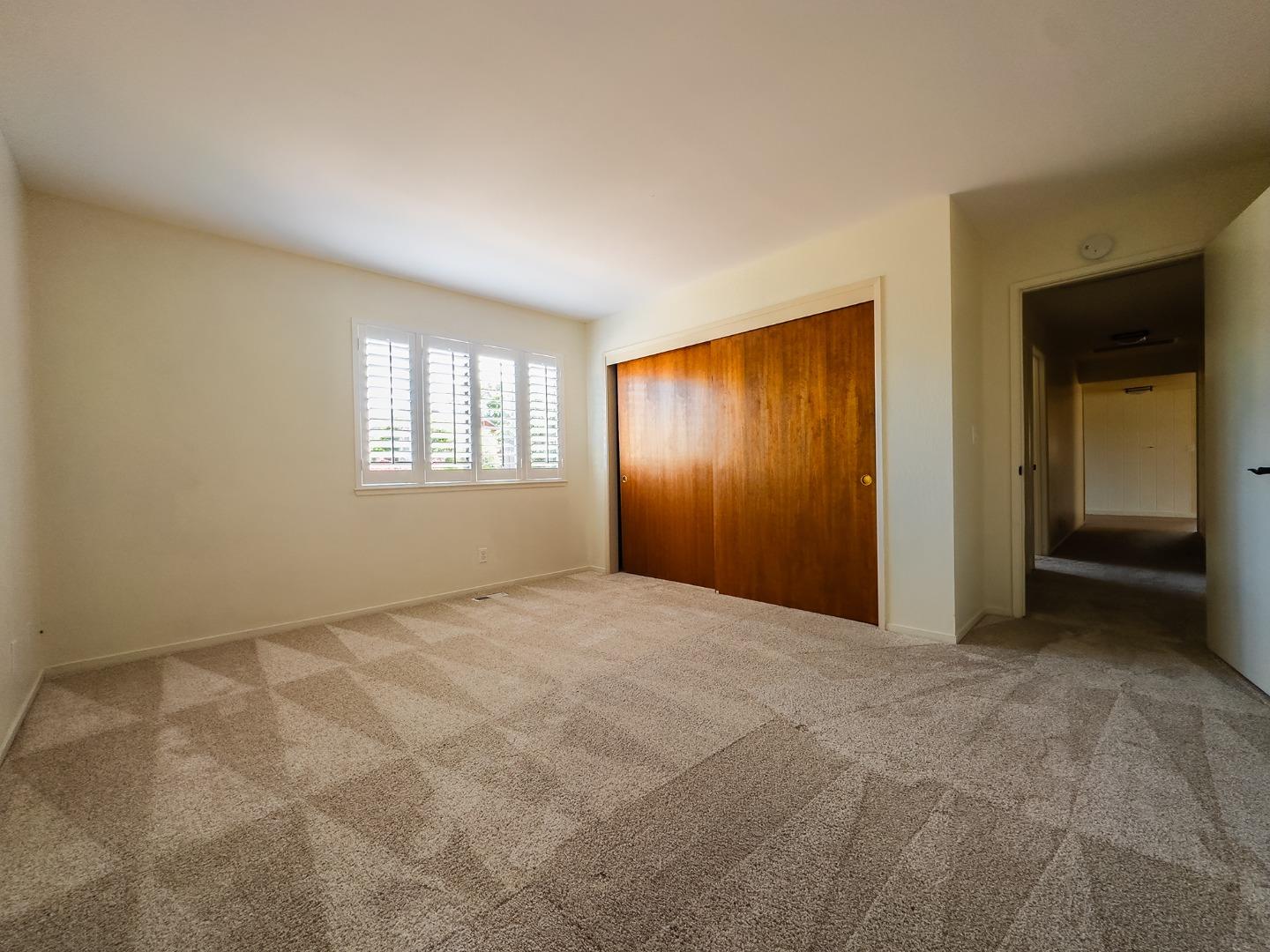 14170 Reservation Road Salinas, CA 93908 - Photo 19 of 22 a view of an empty room with windows and closet