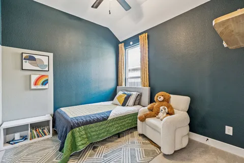 a spacious bathroom with a bathtub and a shower