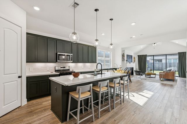 a picture of a bathroom with a shower