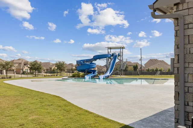 a view of a swimming pool with an ocean