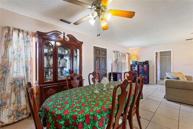 a kitchen with stainless steel appliances a refrigerator and cabinets