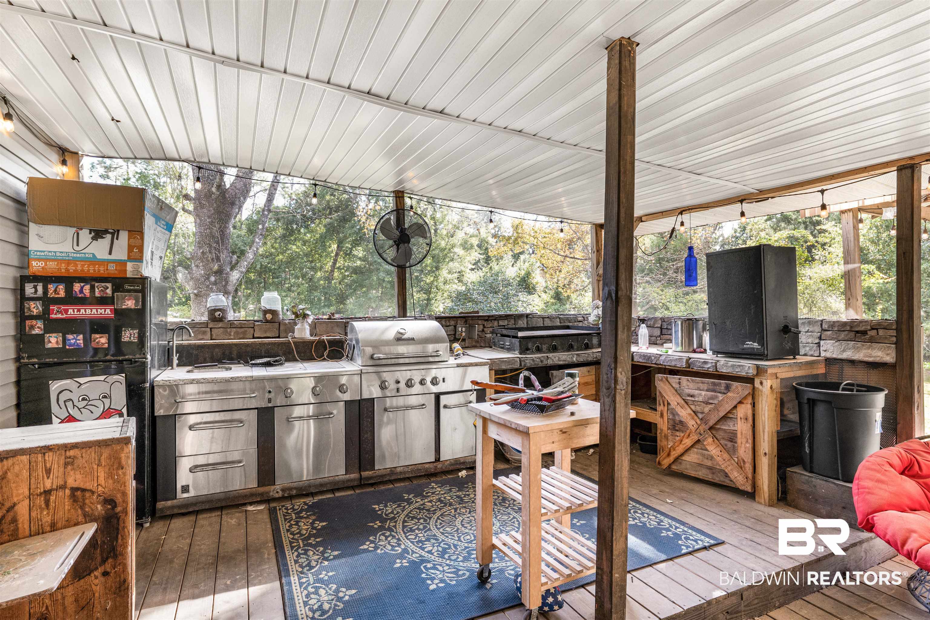 6921 Piney Woods Road Foley, AL 36535 - Photo 27 of 44 Wooden deck featuring area for grilling, sink, and a grill
