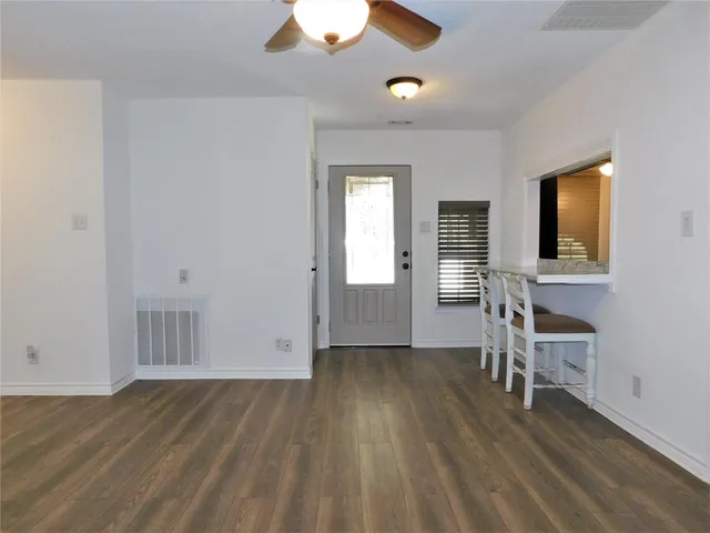 wooden floor and windows in a room