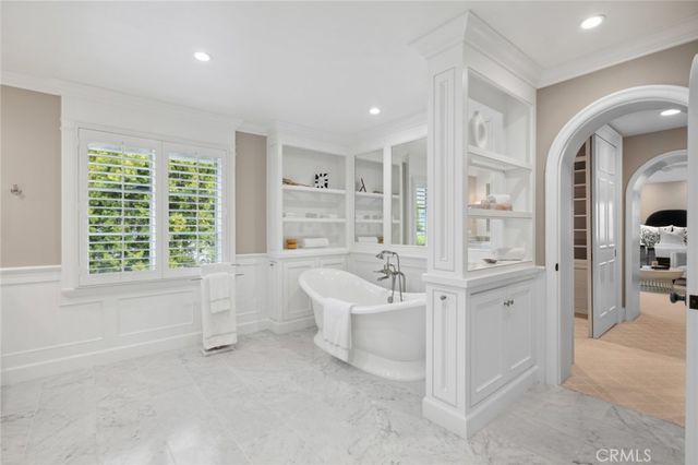 a view of an empty room with empty shelves