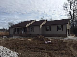 25 Spring Meadows Road Morrison, TN 37357 - Photo 1 of 7 a backyard of a house