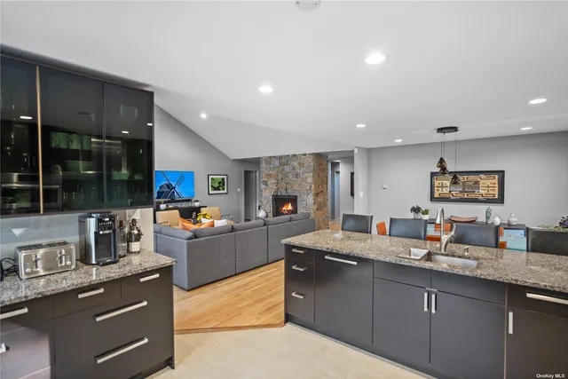 a kitchen with granite countertop lots of counter top space