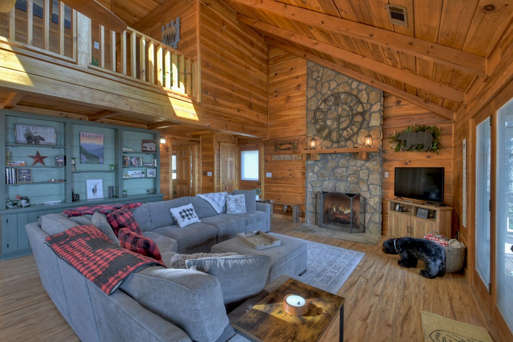 368 Walnut Ridge Ellijay, GA 30536 - Photo 11 of 41 a living room with furniture and a fireplace
