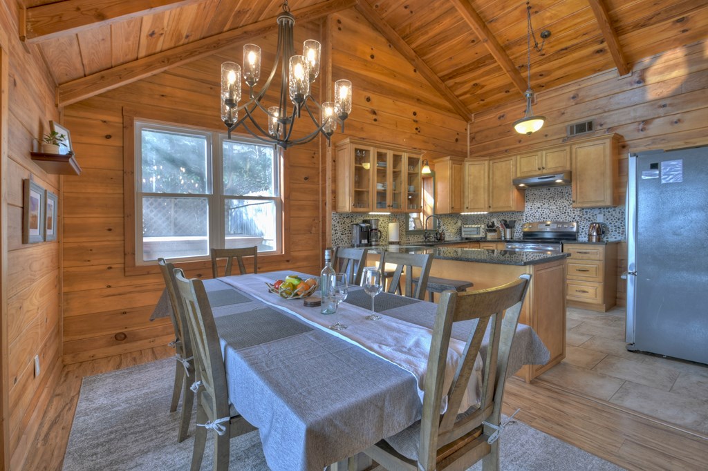 368 Walnut Ridge Ellijay, GA 30536 - Photo 17 of 41 a dining room with furniture and window