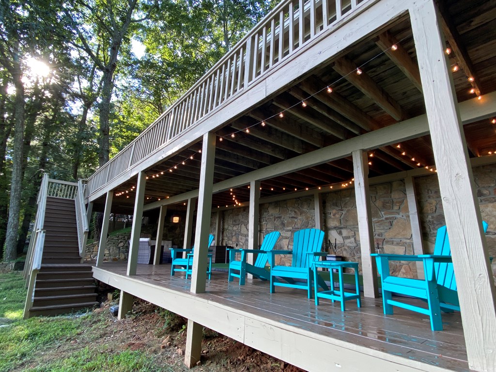 368 Walnut Ridge Ellijay, GA 30536 - Photo 34 of 41 a view of sitting area with wooden stairs and deck