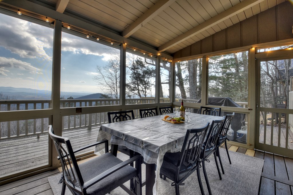 368 Walnut Ridge Ellijay, GA 30536 - Photo 4 of 41 a view of a patio with a table chairs and a table