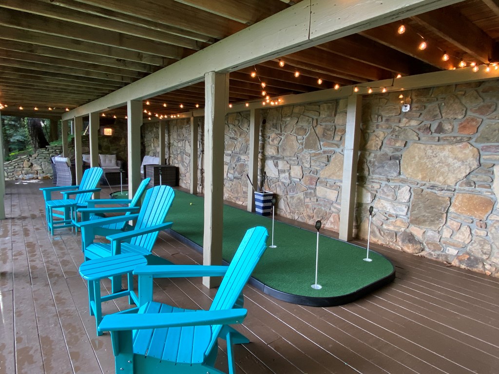 368 Walnut Ridge Ellijay, GA 30536 - Photo 10 of 41 a view of a chairs and tables in patio