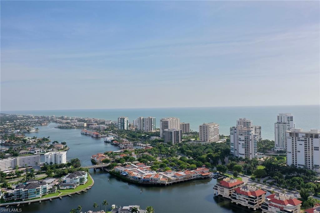 752 Wiggins Lake Drive, Unit 202 Naples, FL 34110 - Photo 32 of 44 Enjoy scenic walking and biking paths that lead to the dining and boutique shopping of Venetian Village