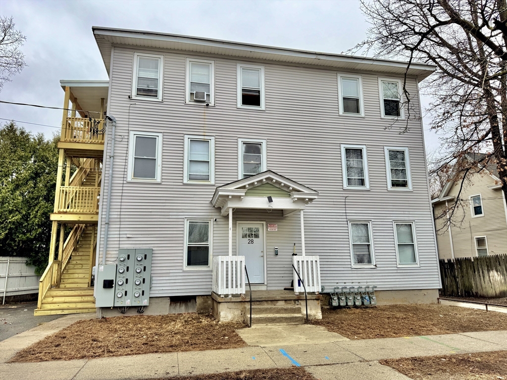 28 Randall Place Springfield, MA 01108 - Photo 1 of 22 a front view of a house