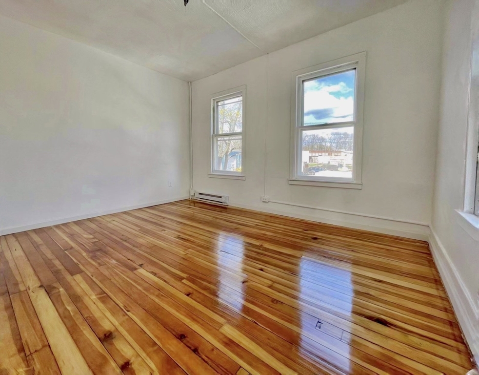 28 Randall Place Springfield, MA 01108 - Photo 16 of 22 a view of a room with wooden floor and window