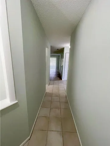 a hallway view with a space