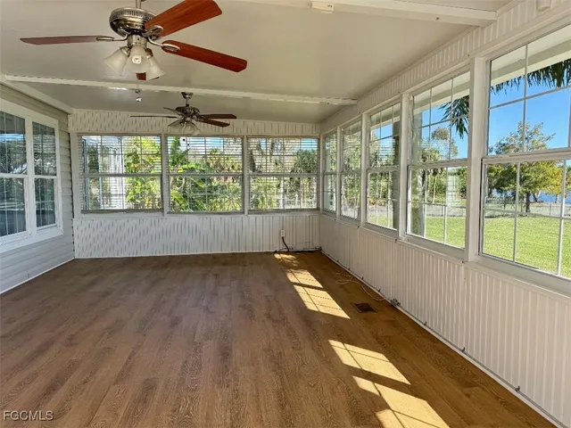 a view of a door and a window