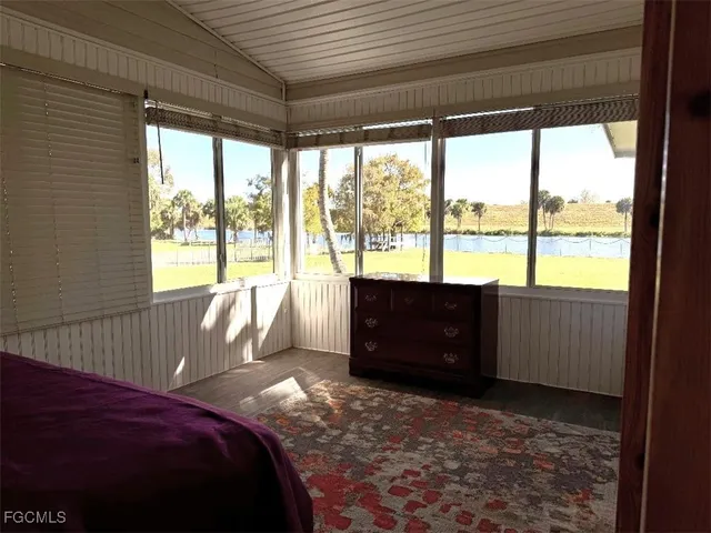 a view of a street with an outdoor seating