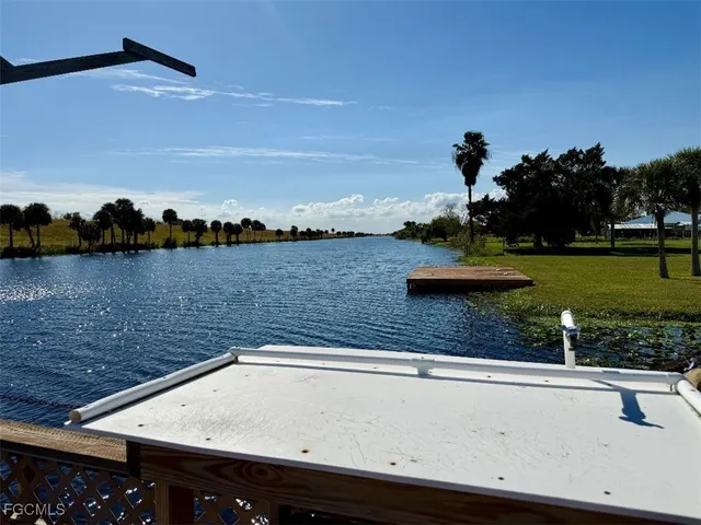 a view of a street with a large parking space