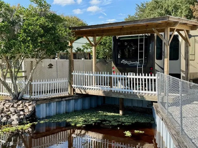 a view of a balcony with chairs
