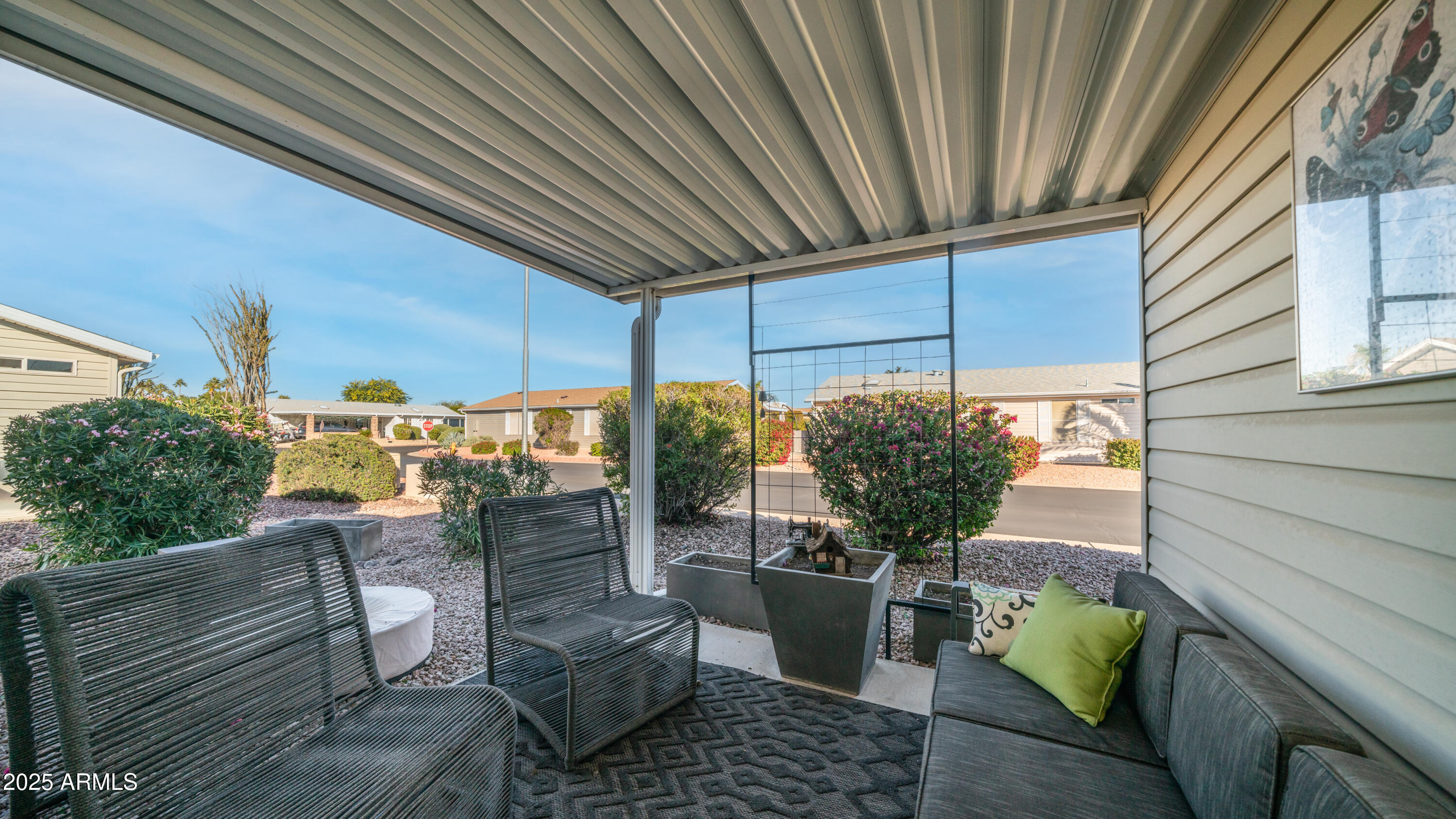 2550 South Ellsworth Road, Unit 751 Mesa, AZ 85209 - Photo 23 of 27 a view of a porch with furniture