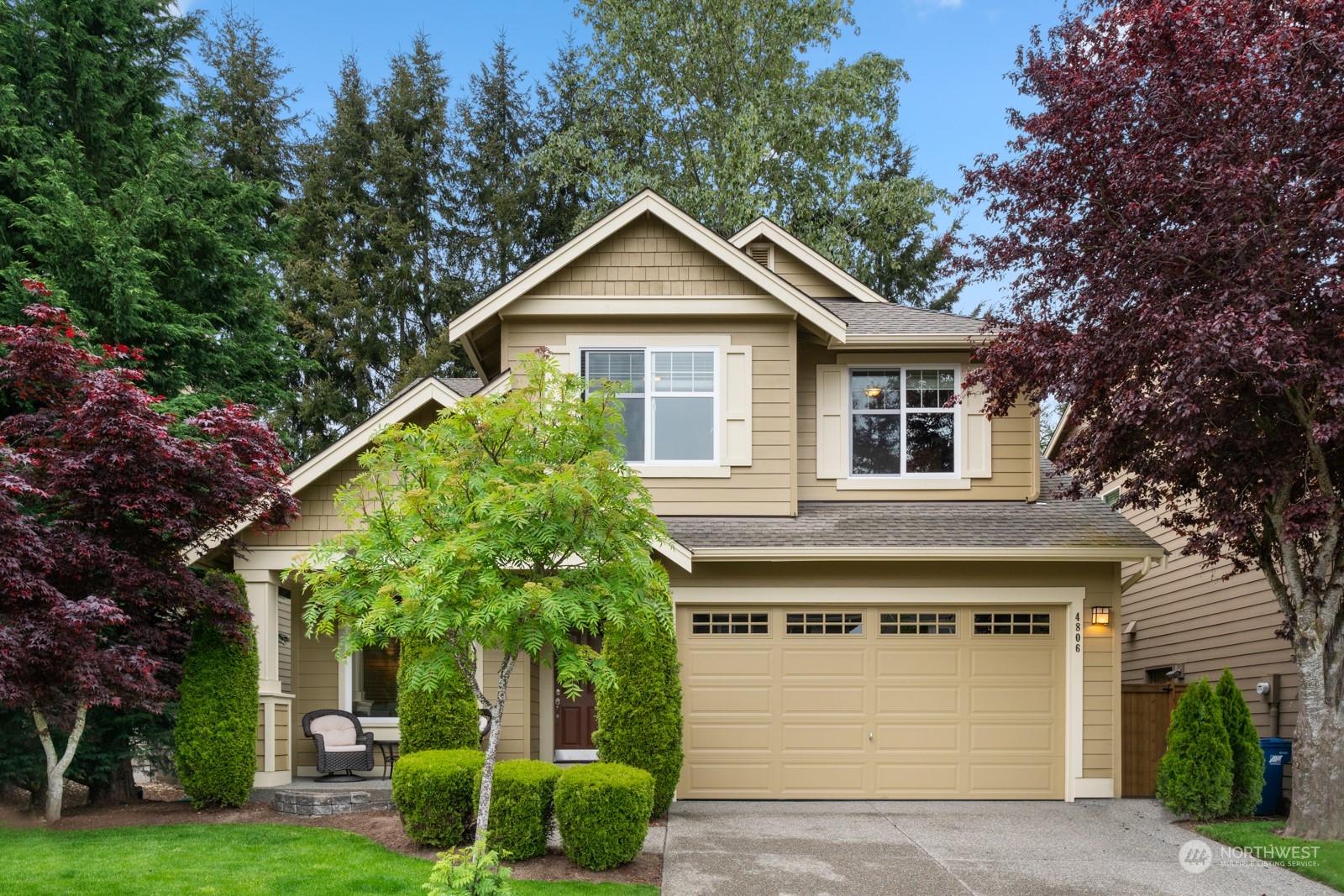 4806 Northeast 3rd Place Renton, WA 98059 - Photo 1 of 32 a view of a house with a yard and plants
