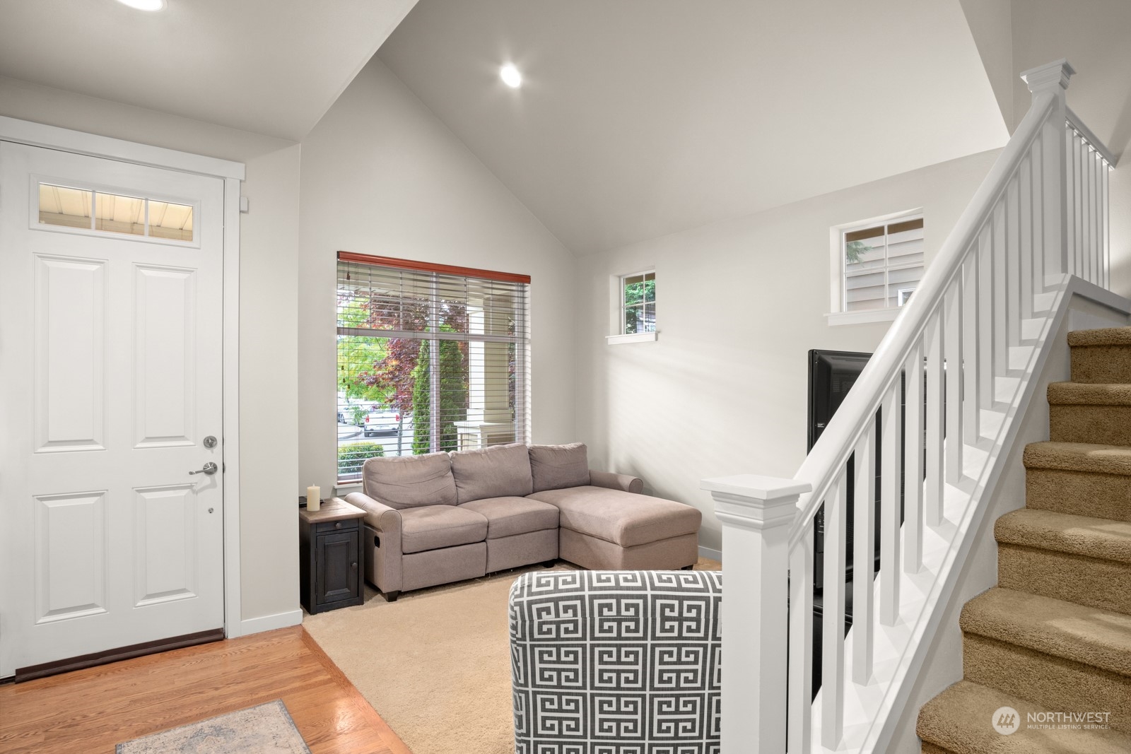 4806 Northeast 3rd Place Renton, WA 98059 - Photo 14 of 32 a living room with furniture and a window with wooden floor