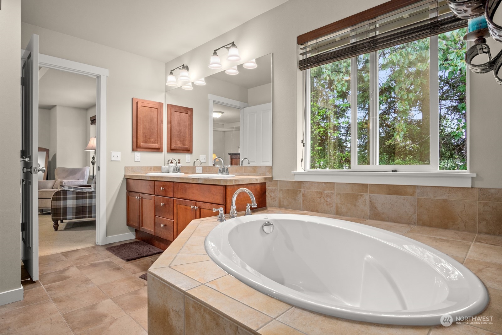 4806 Northeast 3rd Place Renton, WA 98059 - Photo 20 of 32 a spacious bathroom with a bathtub and sink
