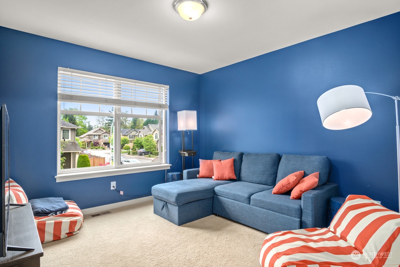 4806 Northeast 3rd Place Renton, WA 98059 - Photo 24 of 32 a living room with furniture and a window