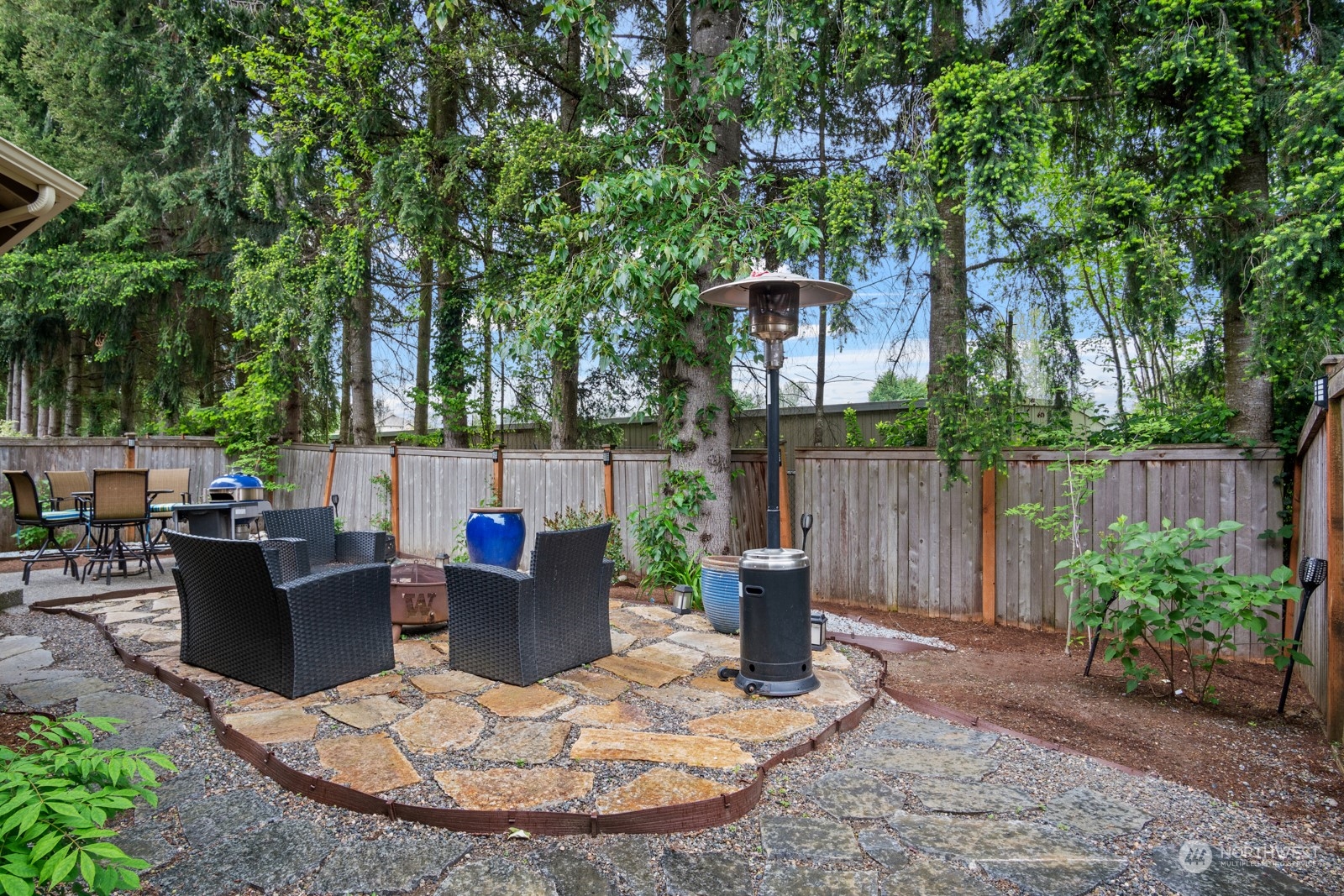 4806 Northeast 3rd Place Renton, WA 98059 - Photo 29 of 32 a view of a backyard with sitting area