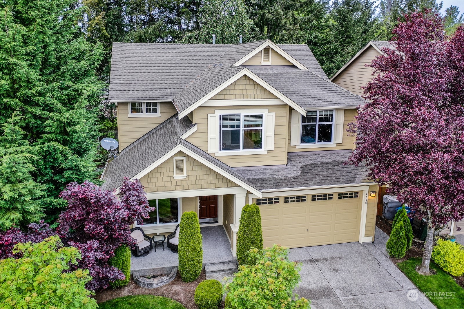 4806 Northeast 3rd Place Renton, WA 98059 - Photo 32 of 32 a front view of house with a garden