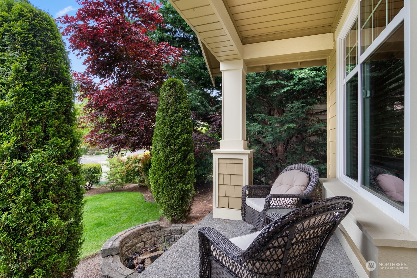 4806 Northeast 3rd Place Renton, WA 98059 - Photo 4 of 32 a view of a chair and fire pit in backyard of the house