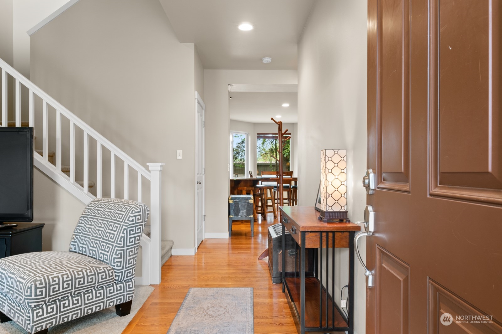 4806 Northeast 3rd Place Renton, WA 98059 - Photo 5 of 32 a living room with furniture and a wooden floor