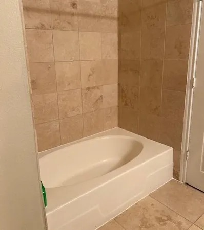 a bathroom with a bathtub