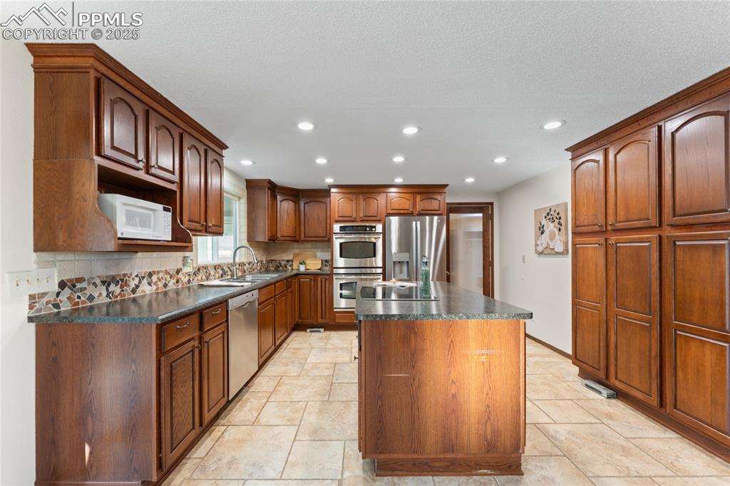 11603 Bradshaw Road Peyton, CO 80831 - Photo 5 of 46