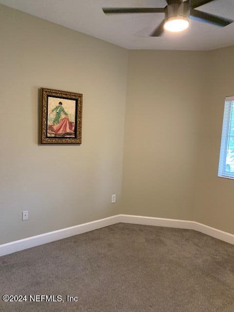 9745 Touchton Road, Unit 1805 Jacksonville, FL 32246 - Photo 33 of 77 an empty room with a workbench
