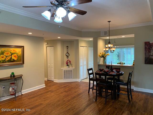 9745 Touchton Road, Unit 1805 Jacksonville, FL 32246 - Photo 47 of 77 a view of a dining room with furniture window and wooden floor