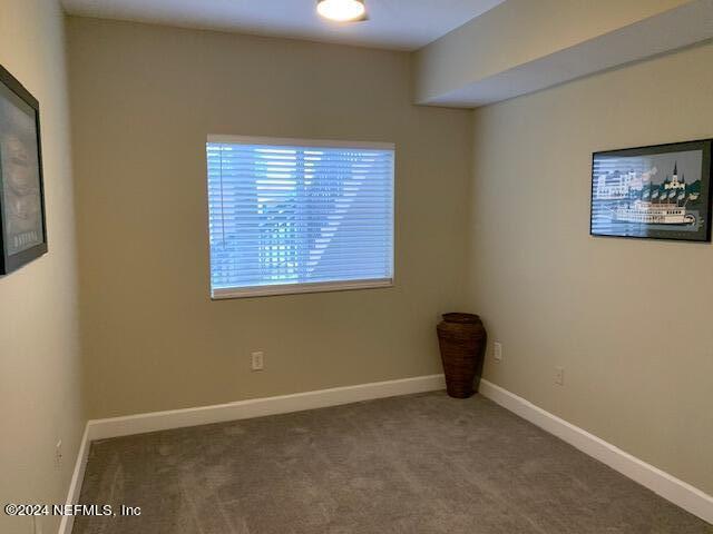 9745 Touchton Road, Unit 1805 Jacksonville, FL 32246 - Photo 60 of 77 a view of an empty room with a window