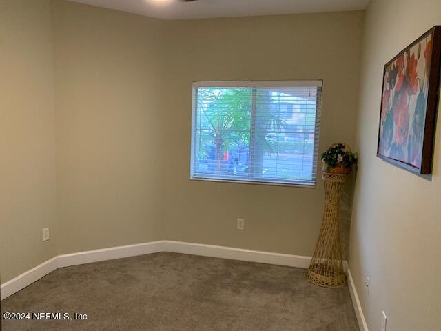 9745 Touchton Road, Unit 1805 Jacksonville, FL 32246 - Photo 61 of 77 an empty room with windows
