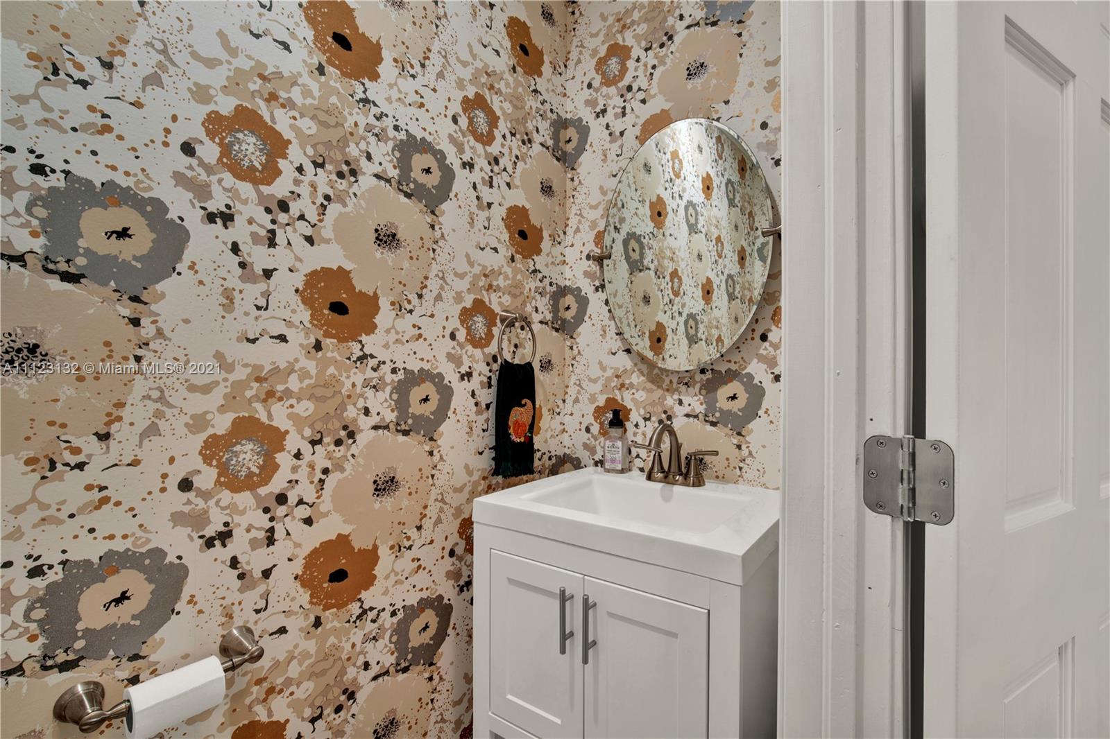 426 Hardee Road Coral Gables, FL 33146 - Photo 19 of 52 a bathroom with a sink and a mirror