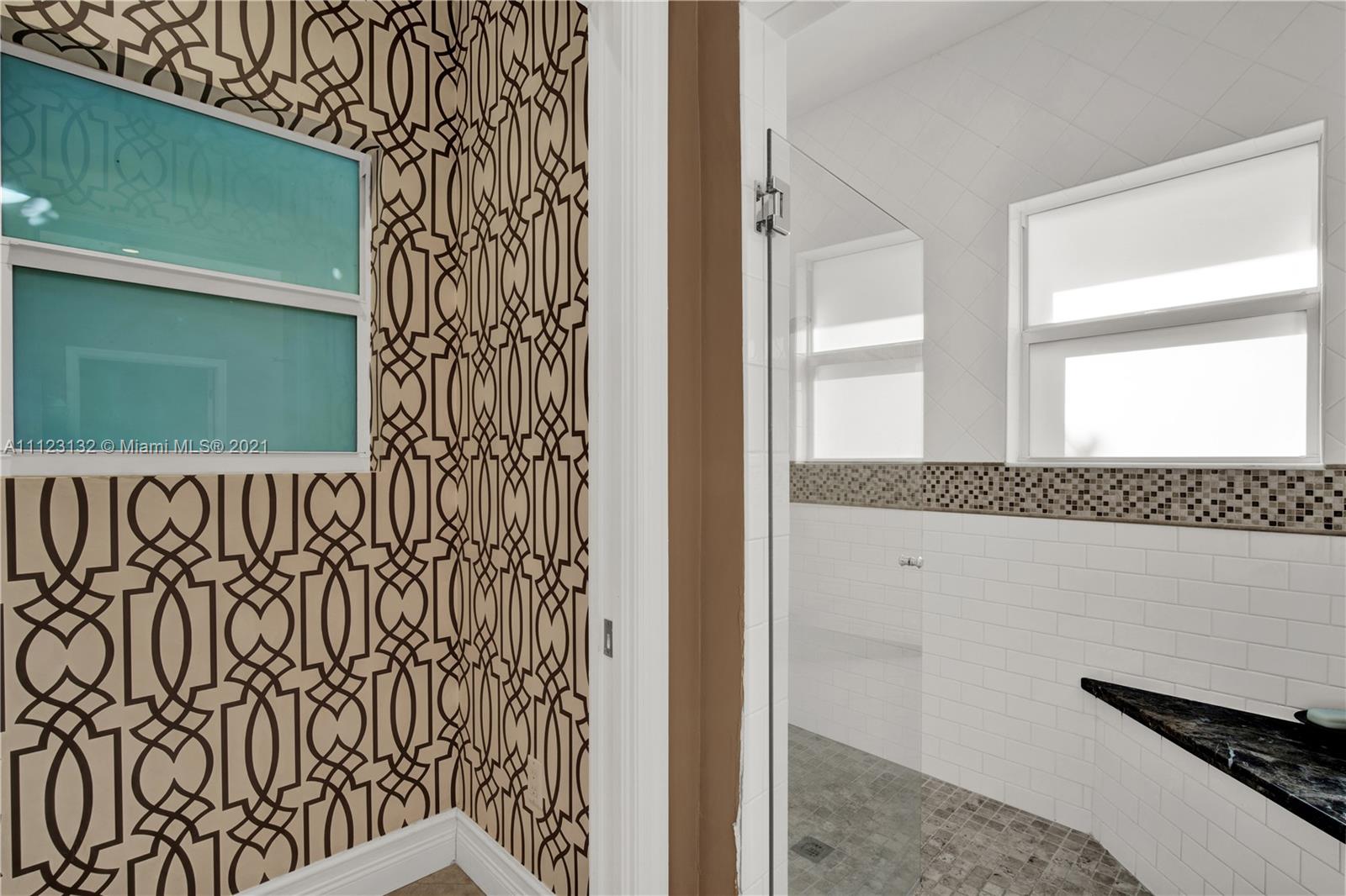 426 Hardee Road Coral Gables, FL 33146 - Photo 30 of 52 a bathroom with a window and a shower