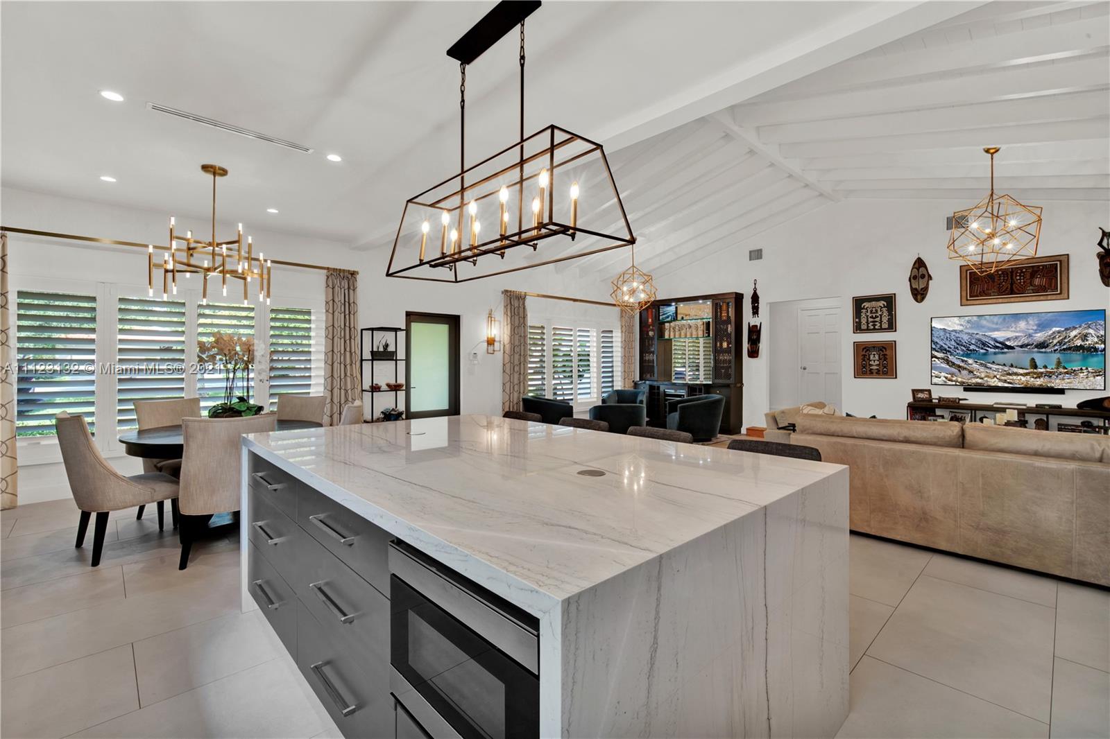 426 Hardee Road Coral Gables, FL 33146 - Photo 4 of 52 a large kitchen with granite countertop a stove and a sink