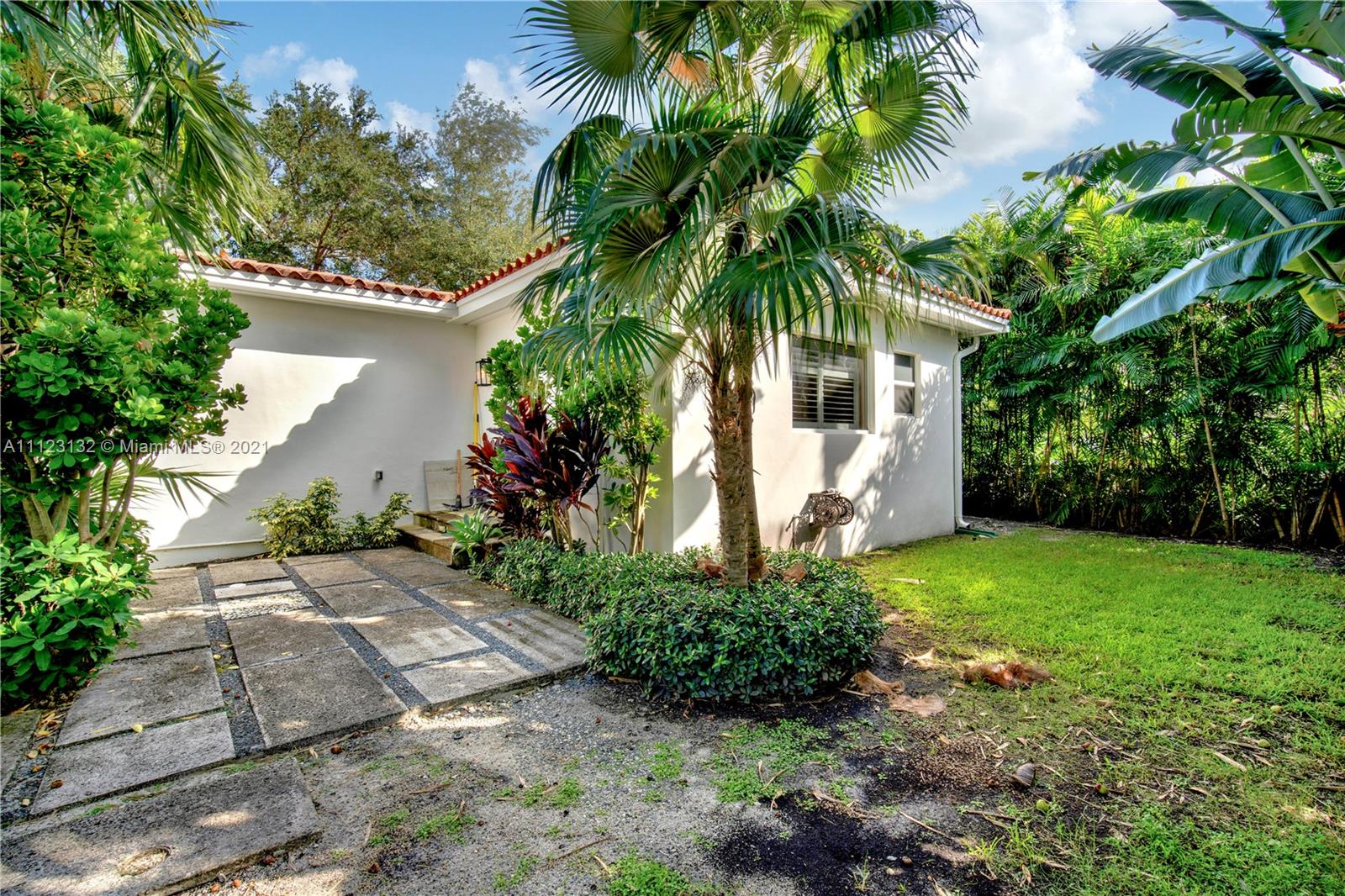 426 Hardee Road Coral Gables, FL 33146 - Photo 46 of 52 a front view of a house with a yard
