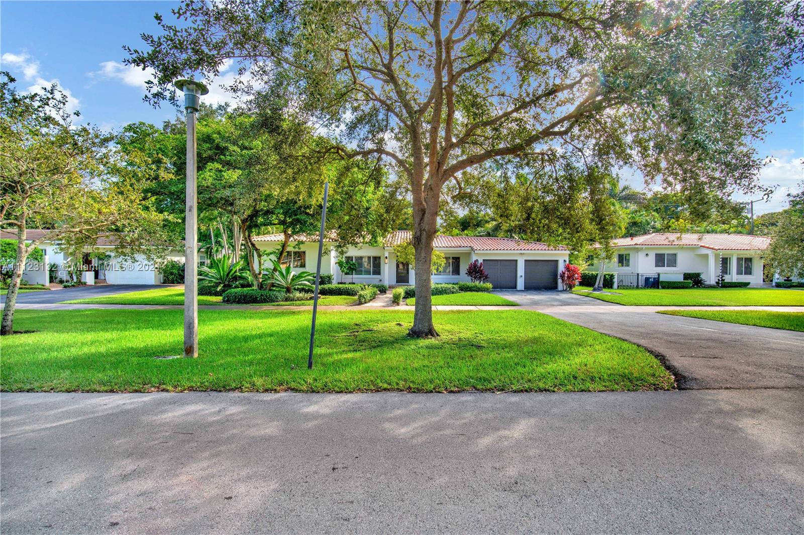 426 Hardee Road Coral Gables, FL 33146 - Photo 50 of 52 a view of a park with large trees