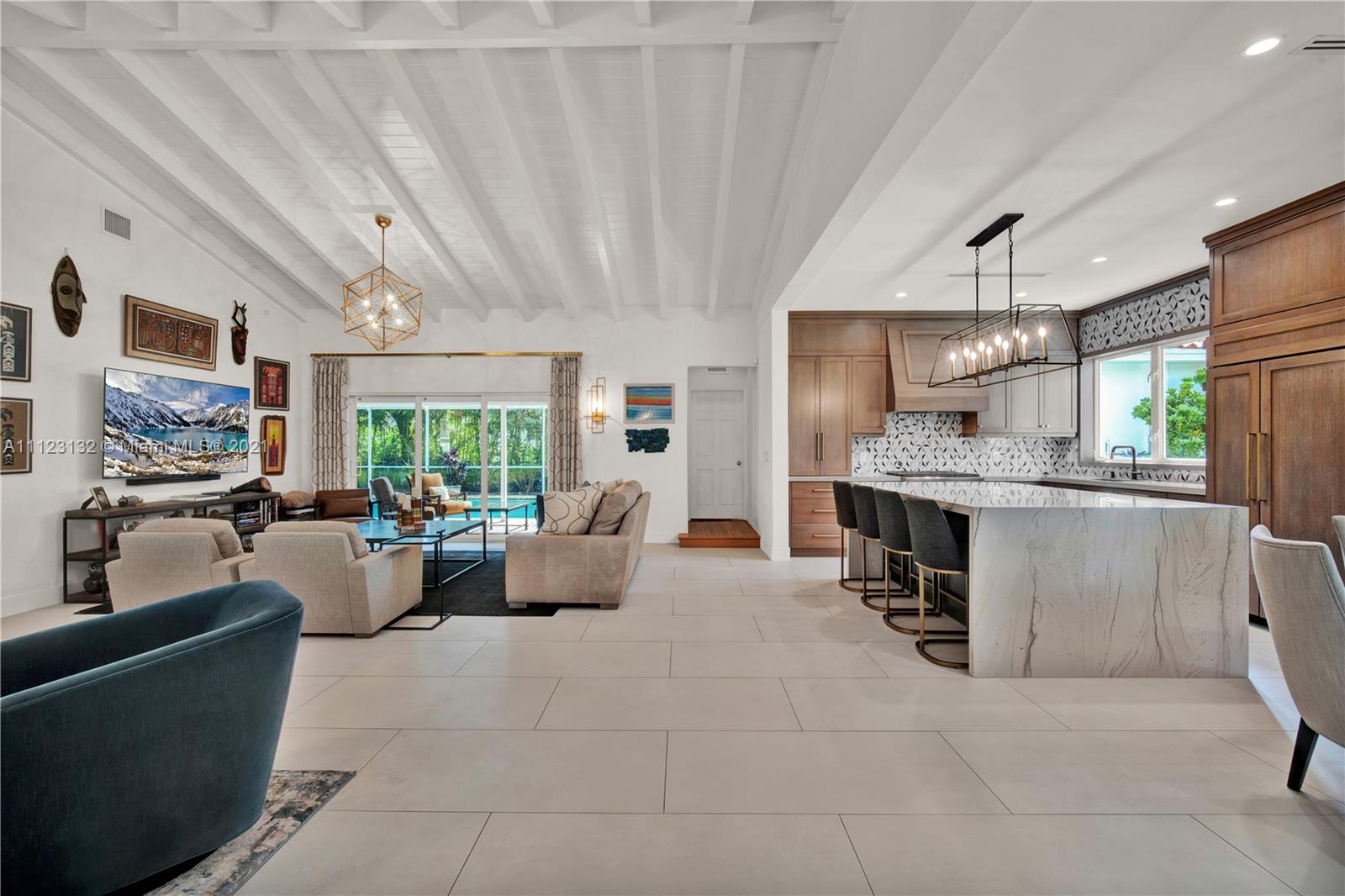 426 Hardee Road Coral Gables, FL 33146 - Photo 8 of 52 a living room with furniture and a open kitchen view