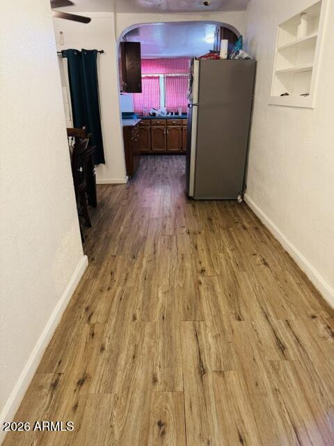 701 6th Green Street Douglas, AZ 85607 - Photo 6 of 10 a room with wooden floor and furniture