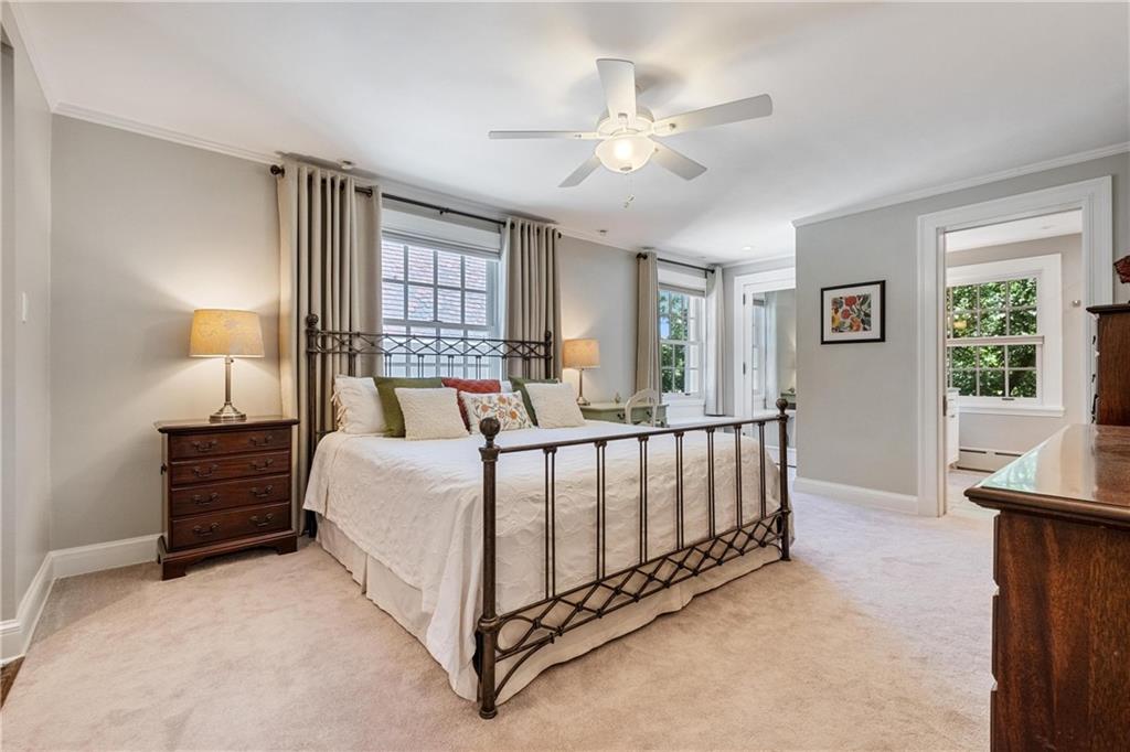 4375 Schenley Farms Terrace Pittsburgh, PA 15213 - Photo 20 of 44 a bed room with a bed and a chandelier